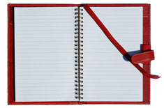 red leather journal with spiral refill